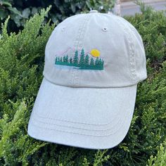 Mountain Peak Forest Trees Hat Custom Embroidered on Beige Baseball Caps for Men, Vintage Ponytail Distressed Hats for Women, Personalized Granola Girl Gifts for Her, Summer Hiking Apparel Unisex - CUSTOM TEXT available on the front of cap (underneath embroidered image) and/or on the back of cap (above strap opening). - Choose a thread color for your custom wording & write into the Personalization Box. Default: white / black depending on the cap color.  - Your wording will be embroidered accordi Vintage Ponytail, Mountain Hat, Wash Baseball Cap, Caps For Men, Distressed Hat, Hat Types, Hats Women, Hat Custom, Mountain Peak