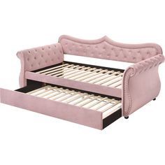 a pink bed frame with two drawers and a pull out trundle for storage