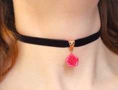 "Black velvet ribbon choker with sculpted pink pearl rose. Rose material is polymer clay with the special pearl cover. Each petal of flower made by hand without any mold Dia flower 13-15 mm/ 0.45-0.55 \" Length of necklace is adjustable:  10-12 inches/ 25,4 - 30,5 cm 11-13 inches/ 28-33 cm 12-14 inches/ 30.5- 35.5 cm 13-15 inches/ 33-38 cm 14-16 inches/ 35.5 cm-40.5 cm 15-17 inches/ 38,1 cm- 43,2 cm 16-18 inches/ 40.6 cm- 45.7 cm 17-19 inches/ 43 cm - 48 cm 18-20 inches/ 45,7 - 50,8 cm     Τhe length you choose considered to be with lobster clasp and one connecting ring +2 inches extended chain. Width of ribbon 10 mm / 0.4 inches     If you need other length of necklace let me know and I will make it for you. Polymer clay isn't afraid of water, strong and non-toxic. Gorgeous gift for women Rose Design Choker Necklace, Gift Rose Design Choker In Rose Color, Rose Design Choker As Gift, Pink Flower Necklace, Navy Blue Earrings, Rose Pendant Necklace, Rose Choker, Black Velvet Ribbon, Ribbon Choker