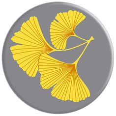 a yellow and gray ginko tree leaf on a grey circle with the word ginko written below it