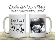 two coffee mugs with the words i can't wait to meet you daddy