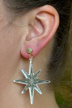 Silver earrings with a unique star shape and a lightweight feel. They are fashionable and are fun for the holidays. From the vendor; We devote great care to crafting every piece, ensuring a high level of attention to detail. Our use of nickel-free metal ensures that each piece is hypoallergenic. While our earrings are designed to be durable, we suggest handling them with care, as they are works of wearable art. Nickel free. Star-shaped Earrings For Pierced Ears As A Gift, Nickel-free Star Jewelry For Parties, Handmade Star-shaped Earrings For Gift, Nickel Free Star Shaped Party Jewelry, Star-shaped Pierced Earrings As Gift, Star-shaped Pierced Earrings For Gifts, Star-shaped Nickel-free Plug Earrings As Gift, Star-shaped Nickel-free Plug Earrings For Gift, Starburst Pierced Jewelry For Gift