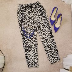 Jogger Style Pants. Elastic In Back Of Waist, Zipper, Hook And Tie In Front. Pockets. 100% Polyester Casual Leopard Print Bottoms For Day Out, Casual Leopard Print Pants For Work, Casual Leopard Print Workwear Pants, Casual Leopard Print Pants With Elastic Waistband, Leopard Print Pants For Summer Loungewear, Leopard Print Loungewear Pants For Summer, Leopard Print Loungewear Bottoms For Spring, Summer Loungewear Leopard Print Pants, Summer Leopard Print Loungewear Pants