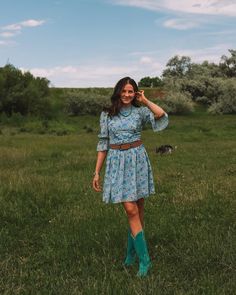 Brighten your summer wardrobe with the Monet dress, featuring a charming blue, yellow, purple, and green floral chiffon. This knee-length beauty has a high ruffled neckline and 3/4 length puff sleeves with delicate ruffle cuffs. The hidden back zipper and v-shaped ruffle bodice detail make it perfect for any sunny day adventure. IG: @marijka_dam western dress, western outfit, cowgirl outfit inspo, cowgirl dress, western style, boot outfit Summer Ruffle Hem Half Sleeve Dresses, Summer Half Sleeve Dress With Ruffle Hem, Summer Dresses With Ruffle Hem And Half Sleeve, Blue 3/4 Sleeve Dress With Ruffles, Dress Western Style, Monet Dress, Outfit Cowgirl, Cowgirl Dress, Dress Western