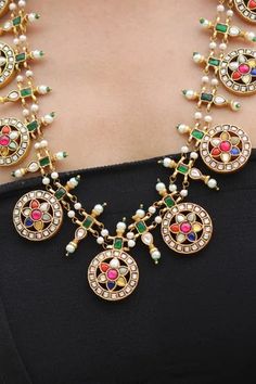 Gold plated necklace with multicolor floral, stone and pearl embellishment. Comes with stud earrings.
Components: 1 Necklace, Pair of Earrings
Type: Floral, stone
Composition: Brass
Color: Multi Color
Handmade
Pearl embellished
Weight (in gms): 178 - Aza Fashions Multicolor Jeweled Kundan Necklace In Fusion Style, Multicolor Jeweled Kundan Fusion Necklace, Festive Multi-stone Necklace, Festive Multicolor Jeweled Bridal Necklace, Elegant Multicolor Round Kundan Necklace, Multicolor Jeweled Bridal Necklace For Festivals, Jeweled Multicolor Bridal Necklace For Festivals, Multicolor Round Kundan Necklace For Party, Multicolor Meenakari Pearl Necklace For Festivals