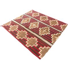 a brown and red area rug on a white background with no people in the photo