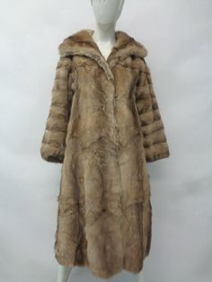 More than just a pretty picture.  Try Vendio Image Hosting.   DESCRIPTION: BEAUTIFUL & VERY STYLISH BEIGE BASSARISK FUR COAT FOR WOMEN! IT IS ACCENTUATED WITH HORIZONTAL FUR DESIGN SLEEVES.  THE COLLAR TYPE IS "WING", IT CLOSES WITH FRONT HOOK & EYE CLOSURE AND HAS TWO SIDE POCKETS. THIS ITEM IS PRE-OWNED: THE FUR AND THE INSIDE LINING ARE "MINT", THE SECOND BEST CONDITION POSSIBLE! AFTER BUYING THIS ITEM, IT WOULD BE VERY MUCH APPRECIATED IF YOU COULD PROVIDE YOUR HEIGHT, WEIGHT AND BUST CIRCUM Vintage Long Beige Fur Coat, Vintage Beige Long Fur Coat, Classic Beige Fur Coat With Faux Fur Trim, Classic Beige Fur Coat With Faux Fur Lining, Coat Jacket Women, Raccoon Fur Coat, Fur Design, Wing It, Coat For Women