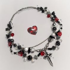 ❥𝙑𝙄𝙑𝙄𝙀𝙉𝙉𝙀: Handmade beaded necklace made with a variety of glass beads, resin mini bows and dice, AB glass drops, reflective beads, czech glass mini silver stars and a variety of black hematite beads. All metal components are 100% STAINLESS STEEL (chains, pendant, hardware...) --Length: approximately 40cm However I always add an extension chain so the necklace can be extended up to 46 cm. If you still need a specific measurement, please send me a message to adjust the piece! :) 💌 🌎 WOR Dark Beaded Jewelry, Vivienne Aesthetic, Alt Necklace, Dark Necklace, Goth Jewelry, Diy Fashion Clothing, Handmade Beaded Necklaces, Mini Bows, Funky Jewelry