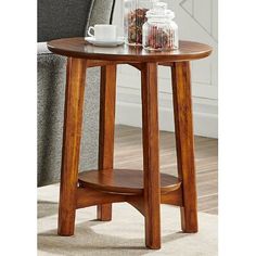 a wooden table sitting on top of a carpeted floor