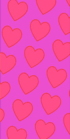 many red hearts on a pink background