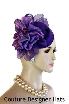 Women's Purple Fashion Designer Haute Couture Fascinator Winter Autumn Spring Hat Headpiece. This Wedding Headpiece Is Made On A Shaped Purple Lightweight Felt Polyester Hat Base.  This Dressy Church Hat Is Embellished With A Large Purple Organza Bow With A Rosette Center. Placed Behind This Bow Is A Handmade Purple Horsehair Crinoline Bow. This Versatile Hat Can Be Placed In Any Position You Desire On Your Head. Please Call For Additional Hat Base Or Feather Colors. Hats Are Made To Order. This Fitted Bridal Accessories For Royal Ascot Party, Fitted Bridal Accessories For Kentucky Derby Party, Elegant Fascinator For Mother Of The Bride, Elegant Purple Fascinator For Church, Elegant Fitted Headpieces For Mother Of The Bride, Elegant Bridal Accessories For Church, Fitted Fascinator Hat For Mother Of The Bride, Elegant Fitted Fascinator For Mother Of The Bride, Elegant Purple Fascinator For Wedding