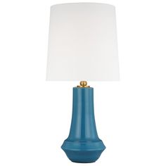 a blue table lamp with a white shade