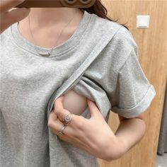 With a relaxed loose fit, this short sleeve nursing top keeps you cool and comfy all day long The pull aside opening makes it easy for nursing while on the go Maternity Nursing Bra, Nursing Tops Breastfeeding, Clothes For Pregnant Women, Nursing Top, Pregnancy Wardrobe, Seductive Clothes, Nursing Tops, Cute Love Couple Images, Solid Clothes