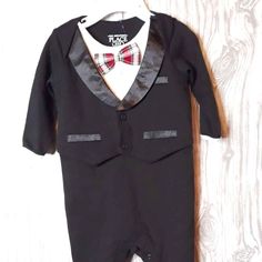 Your Little Guy Needs To Be Ready For Any Special Occasion In This Adorable Black And White Tuxedo With Footies. Snaps For Easy On And Off, Quick Diaper Changes. Nwt New With Tag Size: 0-3 Months Material: 100% Cotton, Silk Lapel Plaid Bow Tags: New Years Eve, Formal, Newborn, Infant, Gift, Special Occasion, Dressy, Church, Baby Shower, Black White A9-2p Shorts Romper Outfit, Shower Black, Halloween Bodysuit, Black And White Tuxedo, Pink Onesie, Halloween Onesie, White Tuxedo, Baby Boy Onesies