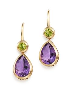 Peridot bezels and amethyst teardrops lend bold color to this drop design in 14K yellow gold. Amethyst And Peridot, Rings Ladies, Peridot Jewelry, Jewellery Necklace, Gold Jewelry Earrings, Yellow Gold Jewelry, Gold Jewelry Indian, Amethyst Jewelry, Exclusive Jewelry