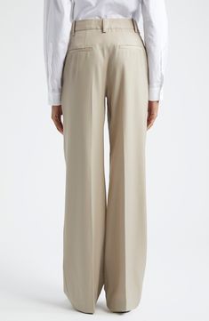 The label's signature minimalism shines through in these timeless straight-leg pants tailored from virgin wool with double pleats and puddling hems. Zip fly with hook-and-bar closure Front slant pockets; back welt pockets 100% virgin wool Dry clean or hand wash, dry flat Imported Designer Clothing This brand has B Corp certification, representing business practices with emphasis on social and environmental performance, accountability and transparency This brand meets Nordstrom Responsible Brands Modern Tailored Wide Leg Pants With Pressed Crease, Beige Straight Leg Pants For Tailoring, Beige Wide Leg Tailored Pants, Modern Wide Leg Pants With Straight Hem For Office, Workwear Full Length Pants With Concealed Placket, Tailored Beige Pants For Formal Occasions, Full-length Workwear Pants With Concealed Placket, Workwear Pants With Concealed Placket, Elegant Wool Beige Bottoms