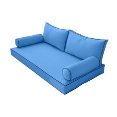 a blue couch with pillows on it