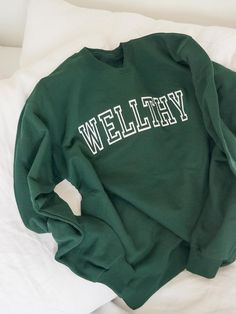 Wellthy Varsity Crewneck Sporty Green Sweats For Fall, Green Sweats For Fall Sports, Green Sweatshirt With Letter Embroidery For Streetwear, Green Long Sleeve Sweatshirt With Letter Embroidery, Green Sweats For Sports In Fall, Green Letter Embroidery Sweatshirt For Streetwear, Green Collegiate Sweatshirt For Sports, Green Sports Sweatshirt For Fall, Varsity Style Letter Embroidery Sweatshirt For Campus