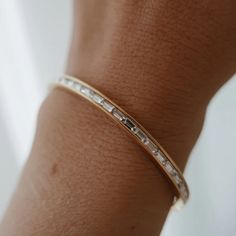 Elevate your style with our Crystal Bangle Bracelet. This 18k gold-plated piece is beautifully adorned with sparkling crystals, offering a refined and elegant charm that complements any outfit. Wedding Bride Jewelry, Womens Bangles, Prom Accessories, Gold Plated Bangles, Stone Bangle, Crystal Bangle, Bangles Style, Anniversary Jewelry, Waterproof Jewelry