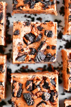 chocolate chip cookie bars with peanut butter and oreo cookies on top, arranged in rows