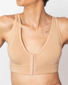 For a seamless post-op recovery after mastectomy or explant surgery, the Rora Mastectomy Bra is the ideal choice. This pocketed front closure bra is designed to securely hold bandages and dressings in place while providing the comforting support your healing process requires. InStyle Magazine has recognized it as the best post-mastectomy bra for its outstanding blend of softness, adjustability, and style. Its front closure design simplifies post-surgery dressing, and the wide back bridge offers Compression Bra Surgery, Explant Surgery, Back Bridge, Post Mastectomy Bras, Clothing Making, Post Surgery Bra, Small Bra, Compression Bra, Front Closure Bra