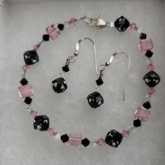 Handmade Crystal Bracelet And Earrings Black, Clear And Pink Crystal Beads Sterling Silver Clasp And Ear Wires Bracelet Measures 7 3/4 Inches New, Never Worn Smoke-Free And Pet-Free Home Pink Jewelry With Adjustable Black Beads, Pink Jewelry With Black Beads For Gift, Elegant Pink Jewelry With Black Beads, Pink Jewerly, Triple Wrap Bracelet, Red Coral Necklace, Crystal Fashion, White Sapphire Ring, White Topaz Rings