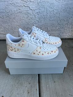 Hand painted Air Force 1's. This design is gender-neutral and fits every occasion.  This design is one of my favorites; however, I can design the exact shoe you're looking for upon request in any size (please message). Whether you're treating yourself or looking for a personalized gift, these one-of-a-kind sneakers will definitely turn heads and elevate your streetwear style. This design can be painted onto any size of your choice upon purchasing. When ordering, please let me know which size you Custom White Sneakers For Spring, Hand Painted White Low-top Custom Sneakers, Hand Painted White High-top Custom Sneakers, White Hand Painted High-top Custom Sneakers, Custom White Leather Sneakers, Casual Hand Painted White Custom Sneakers, Casual Hand Painted White Sneakers, Custom White Sneakers With Rubber Sole, Sporty Hand Painted White Sneakers