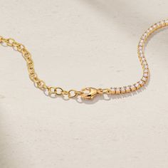 Refined to the core, our Half and Half Tennis Necklace puts a spin on an essential jewelry classic. Scores of vivid rubies and twinkling diamonds are secured in a minimal four prong setting as each link lays flush along your neckline for an elegant and minimalistic profile. We've attached additional chain to offer you the ability to adjust the total length of the necklace in order to find your most comfortable fit. Wear it solo as a choker or layer it together with both shorter and longer chains Essential Jewelry, Jewelry Classic, Diamond Tennis Necklace, Half And Half, Jewelry Essentials, Tennis Necklace, Long Chain, Prong Setting, Choker