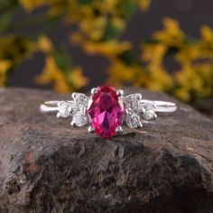 "Simple & dainty womens sterling silver ruby ring, Unique ruby promise ring for her, Womens art deco ruby silver ring, Ruby engagement ring WE OFFER UNLIMITED PERIOD INSTALLMENTS PLAN This is a beautiful, stunning, feminine ring that works well for all occasions, styles, and ages. You will love it! Ring information Main stone: White cubic zirconia Approximate size: 6x4mm Accent stones: White cubic zirconia Approximate size: 2.0mm (6 stones) Metal type: Silver Metal stamp: 925 Sterling SIlver Fine Jewelry Ruby Ring With Cubic Zirconia For Promise, Elegant Cubic Zirconia Ruby Ring As Gift, Lab-created Ruby Ring With Diamond Accents As Gift, Classic Ruby Ring For Valentine's Day, Elegant Lab-created Ruby Promise Ring Jewelry, Elegant Lab-created Ruby Birthstone Ring For Anniversary, Elegant Lab-created Ruby Jewelry For Promise Ring, Lab-created Ruby Rings With Diamond Accents For Gift, Gift Ring With Diamond Accents And Lab-created Ruby