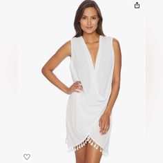 Brand: Athena Size: Medium Color: White Condition: New With Tags Can Be Worn As A Wrap Dress Or Open. Be Sure To Check Out The Other Swim Items I Have Listed For A Bundle! White Flowy V-neck Beach Dress, White Flowy V-neck Cover-up, Elegant Sleeveless Cover-up, White One-piece Dress For Beach Season, White Sleeveless Chic Cover-up, Elegant Sleeveless Spring Cover-up, Chic White V-neck Cover-up, White One-piece Dress For Poolside, Elegant Sleeveless Vacation Cover-up