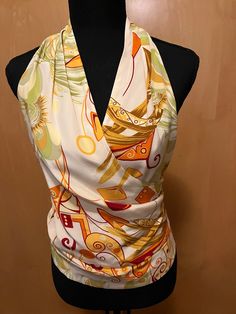 Lafayette 148 100 % silk, white with multi-colored abstract citrus colors, (orange, lemon, lime) sleeveless halter wrap blouse Fitted Multicolor V-neck Halter Top, Sleeveless Silk Tops For Summer, Spring Orange Silk Top, Orange Silk Top For Spring, Orange Silk Tops For Spring, Multicolor V-neck Halter Top For Summer, Multicolor V-neck Halter Top For Spring, Summer Party Printed Blouse, Elegant Summer Halter Top