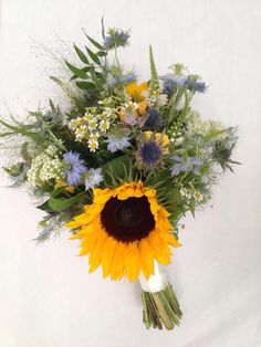 a bouquet of wildflowers and other flowers on a white background