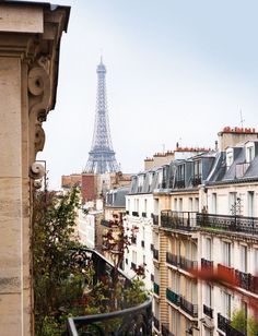 view of the eiffel tower from an apartment building