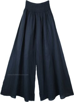 A pair of palazzo pants in dusky blue that you can wear in every season, these pants are extremely comfortable and are made of light weight fabric. The bottom of the pants is very wide, which gives it a flow and a feminine look as you walk. These pants have pin tuck details at the bottom near the hemline. Perfect for summer evenings out with friends, you can simply wear these casual wide leg pants with a solid top of any color you like according to the occasion. Wear some jewelry to enhance your Pallazo Pants Outfit, Wide Leg Cotton Pants, Cotton Palazzo Pants, Dusky Blue, Wide Leg Palazzo Pants, Hippie Look, Scarf Shirt, Trendy Skirts, Casual Wide Leg Pants