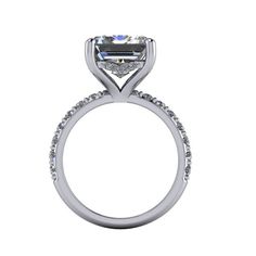 Emerald Cut Colorless Moissanite engagement ring shown with a 12x10mm, 6.77 ct Emerald Cut Colorless Moissanite, DEF Color, VVS Clarity. Round Side Stones - 2mm round lab grown diamonds, GH Color, SI1 Clarity, .76 ctw. Engagement Ring Band width 2.2mm. *7.53 carat total weight. *The ring is custom made just for you in your ring size and metal preference.*Please contact us prior to purchasing with any questions, we are happy to help. Radiant Cut Moissanite Wedding Ring In White Gold, Emerald Cut Lab Grown Diamond Jewelry For Anniversary, Radiant Cut Lab Grown Diamond Ring With Prong Setting, Radiant Cut Moissanite With Vvs Clarity For Wedding, Promise Ring With Princess Cut Brilliant Emerald, Promise Ring Emerald With Brilliant Princess Cut, Princess Cut Brilliant Emerald Ring For Promise, Timeless Asscher Cut Diamond Ring For Proposal, Wedding Emerald Ring With Asscher Cut And Diamond Accents