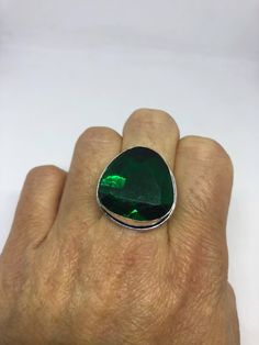 Large brilliant emerald green antique glass Ornate German Silver NOT 925 Vintage ring, does not tarnish Size 7 can be re sized, my jeweler charges a $10 - $15 fee All rings are shipped free in the US in a nice gift box. Check out our over a THOUSAND great reviews Engraving is $4 per letter and is not always perfect depending on the piece. It can take a few days if the jeweler is busy. This is payable to Paypal Judithsltd@gmail.com Elegant Large Green Emerald Ring, Elegant Green Emerald Ring With Large Stone, Elegant Large Stone Green Emerald Ring, Unique Green Emerald Ring For Formal Occasions, Green Jewelry With Large Round Stone, Unique Green Faceted Jewelry, Unique Green Sterling Silver Crystal Ring, Unique Faceted Green Jewelry, Unique Green Crystal Ring In Sterling Silver