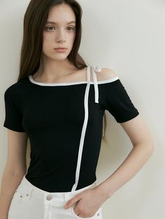 This is a trendy and casual top by REORG that is made out of high quality and sturdy material. With distinctive mood of the design and comfortable wear, you can style it for your casual daily outfit.- Ribbon detail on the neckline- Color blocked neckline and strap- Soft and elastic touch of fabric Versatile Black T-shirt For Summer, Spring Black Crop Top, Versatile Black Fitted Top, Black Fitted Versatile Top, Black Trendy Tops For Spring, Black Fitted Summer Top, Black Fitted Top For Summer, Trendy Black Tops For Spring, Trendy Black Spring Tops