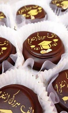 chocolates with arabic writing on them in white paper