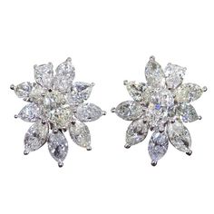 Diamond Cluster Earrings | From a unique collection of vintage Clip-on Earrings at https://www.1stdibs.com/jewelry/earrings/clip-on-earrings/. Classic Diamond Earrings, Marquise Earrings, Diamond Huggie Earrings, Marquise Shape Diamond, Diamond Cluster Earrings, Starburst Earrings, Platinum Earrings, 18k Gold Earrings, Swirl Earrings