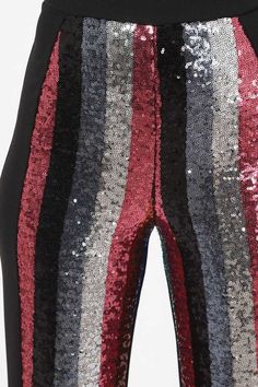 Shine the night away in these colorful sparkle detail pants. -High Waist Colorful Striped Sequin Pants- Solid Color on Back w/ Zipper - Flared Leg Design -Some Stretch CARE: - Hand wash cold, do not bleach, flat dry Fabric: KNIT AND WOVEN Multi Colored Sequin Pants, Glamorous Red Sequined Bottoms, Glamorous High-waist Sequined Bottoms, Luxury Sequin High-waisted Pants, High-waisted Sequin Stretch Pants, Sequin Pants, High Waisted Pants, That Look, Zipper