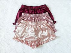 LISTING IS FOR A PACK OF 3 Gorgeous, silky soft satin adult pajama shorts that are perfect all year round! A perfect pair to wear while lounging around the house. Great for birthday gifts, Christmas gifts, Valentine's Day, or even Bridal parties! Comes with a stretchy elastic waistband for a comfort. Cute ruffle trim finishes off the shorts. 100% Satin If interested in only one satin pj short, you can purchase here: https://www.etsy.com/listing/1168950451/loungewear-satin-ruffle-trim-shorts?clic Short Satin, Pyjama Satin, Party Photoshoot, Women Sleepwear, Adult Pajamas, Pj Shorts, Satin Shorts, Bridal Parties, Etsy Wedding