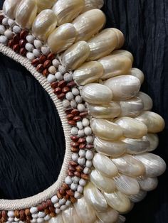 Slipper Shell Necklace from Asmat Tribal group in Papua, New Guinea! This is a vintage piece worn by tribal leaders for dance, rituals and ceremonies! Includes display stand. Can be worn or displayed in your collection on the stand. Stylish to wear at parties and events or great collector’s piece!