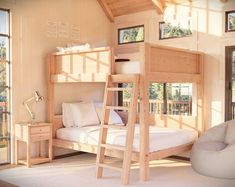 a bedroom with bunk beds and white pillows