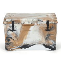 an artisticly designed cooler bag with handles on the front and side, sitting against a white background