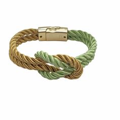 Show off your pride for your university, college, fraternity, sorority, favorite sports team colors, or country flag colors. The Original Love Knot Silk Rope Bracelet is custom-made with a satin braided rope design connected with a magnetic clasp. It is approximately 7.5 inches to 8.5 inches long and is adjustable. Be careful of imitation low-quality bracelets sold on other sites. If you want the best, get The Original Love Knot Silk Rope Bracelet here! Don't see your colors represented? Contact Casual Bracelets, Social Organization, Green Rings, Love And Pride, Braided Rope, Knot Bracelet, University College, Rope Design, Color Pairing