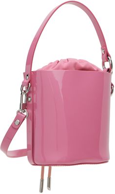 Patent leather top handle bag in pink. · Fixed carry handle · Adjustable and detachable shoulder strap · Logo hardware at face · Cord-lock drawstring closure · Twill lining · H7 x W6.5 x D4.25 Supplier color: Pink The Vivienne, Drawstring Bucket Bag, Pink Daisy, Handle Bag, Pink Leather, Vivienne Westwood, Leather Top, Top Handle, Bucket Bag