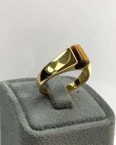 Tiger Eyes Men Ring, Blue Pinky Ring, Cylinder Genuine Gemstone, Stylish Gold Silver Ring, Handmade Jewelry, Best Gift for Him ◎ Details ◎ ○ Material 14K Solid Gold or 925 Sterling Silver Weight of Ring : approx 7.00 gr Height of Ring : approx 6.15 mm Width of Band : approx 6.80 mm ○ Upgrade to Solid 18K Gold, please click the link below: https://www.etsy.com/listing/962826004 ○ Gemstone Natural Tiger Eyes approx. 6.80 mm x 6 mm approx. 1 ct Made to Order HANDMADE ITEM ○ For Men Collection : htt Modern Gold Opal Ring With Polished Finish, Classic Brown Rings With Polished Finish, Elegant Brown Signet Ring For Anniversary, Brown Polished Signet Ring For Anniversary, Modern Brown Rings For Gifts, Modern Brown Rings For Gift, Brown Polished Finish Signet Ring For Anniversary, Modern Brown Rings For Anniversary, Formal Brown Rings With Polished Finish