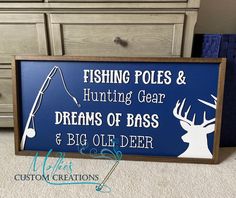 a sign that says fishing poles and hunting gear dreams of bass and big oleder