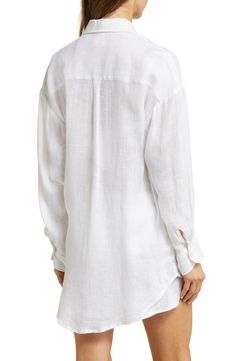 This oversized cover-up shirt woven from lightweight linen is a must-pack companion for your next sunny getaway. 32 1/2" length (size Medium)   Front button closure   Spread collar   Long sleeves with button cuffs   Curved high-low hem   100% linen   Hand wash, dry flat   Imported   As a member of 1% for the Planet, Vitamin A has committed to donating 1% of its annual sales to nonprofit partners in support of environmental solutions Vacation Linen Long Sleeve Shirt, Long Sleeve Linen Shirt For Vacation, Vacation Linen Blouse With Long Sleeves, Linen Long Sleeve Blouse For Vacation, Long Sleeve Linen Blouse For Vacation, Relaxed Linen Vacation Shirt, Versatile White Beach Blouse, Versatile White Blouse For Beach, Oversized Versatile Blouse For Beach