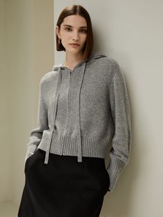 Made with a blend of wool and cashmere, this hoodie, showcasing a high cuff ribbing, is the epitome of athleisure with understated elegance. This piece can effortlessly transition from stylish outerwear to essential layering for colder seasons. Wool Hoodie Outfit, Wool Hoodie, Silk Pajamas Women, Silk Nightwear, Camisole Set, Silk Clothes, Cashmere Hoodie, Striped Midi Skirt, Silk Knit